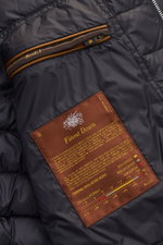 Close-up interior view of Moorer Down blouson 'Oniro' navy, showing quilted lining, zip pocket with "Moorer" label, and Finest Down patch. Maximum function in lightweight fabric: the sporty down blouson 'Oniro' has a warm down lining and water repellent f