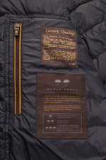 Close-up inside view of the Moorer Down blouson 'Oniro' navy showing quilted lining, zip pocket, and luxury quality labels.

Description: Maximum function in incredibly lightweight fabric: The sporty down blouson 'Oniro' has a warm down lining and a water
