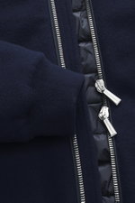 Close-up front view of the Moorer Down blouson 'Brigno' navy showing knitted virgin wool-cashmere blend fabric, silver two-way zipper, and elastic rib cuff. High performance at temperatures from above freezing to below zero: The knitted down blouson 'Brig