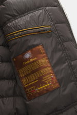Close-up interior view of the Moorer Down blouson 'Brigno' grey-brown melange showing quilted lining, zipped inner pocket with Moorer logo, and Finest Down label. High performance at temperatures from above freezing to below: The knitted down blouson 'Bri