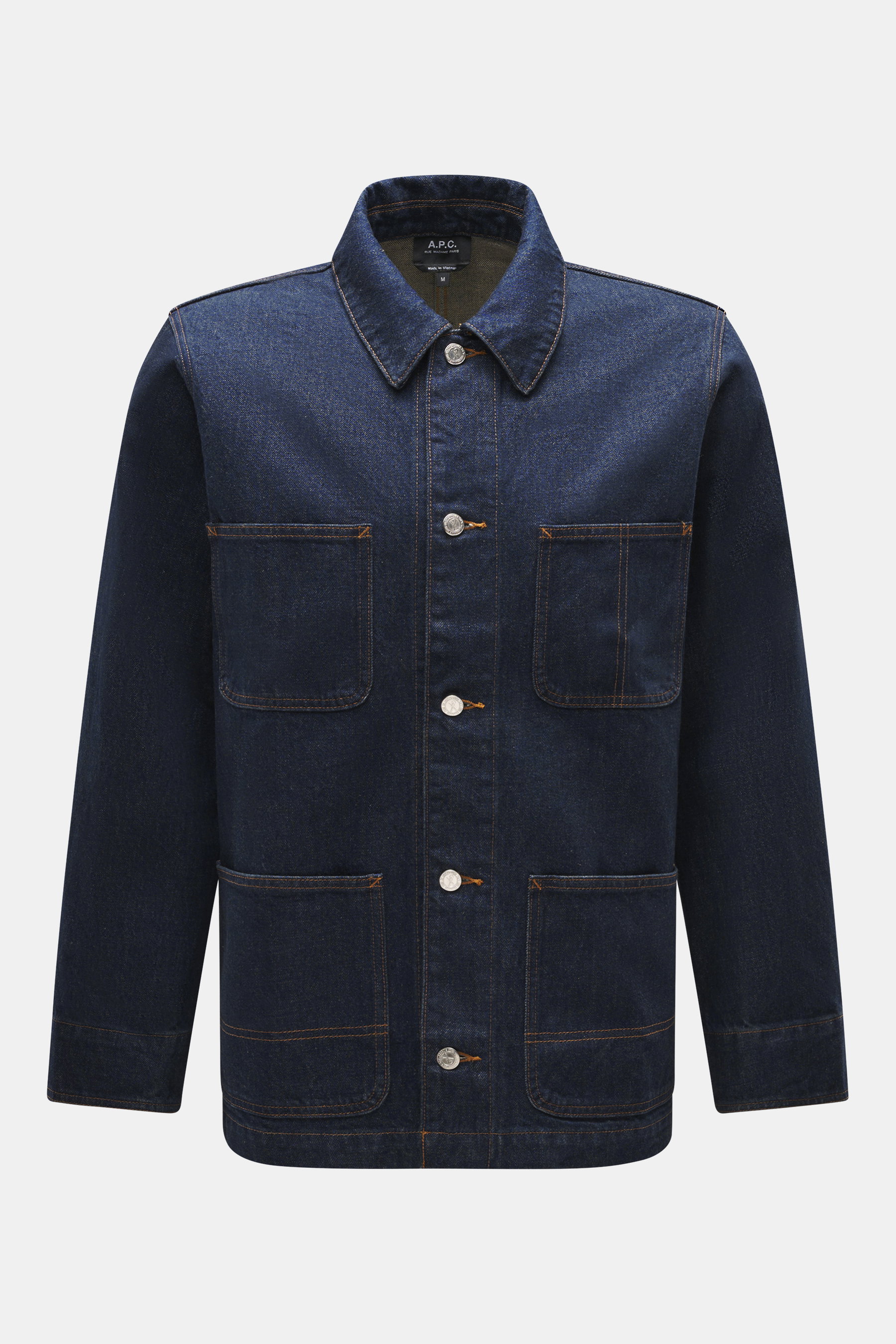 Front view of A.P.C. Denim jacket navy in slim fit, denim made of pure cotton with grippy quality, featuring a five-button placket, turn-down collar, four front pockets, and sleeve cuffs with button.