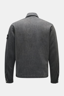Stone Island Denim jacket 'Black Denim Light Grey Wash' grey shown from back, slim fit denim made from pure cotton, typical material structure, turn-down collar, buttoned sleeve cuffs, compass badge on upper arm.