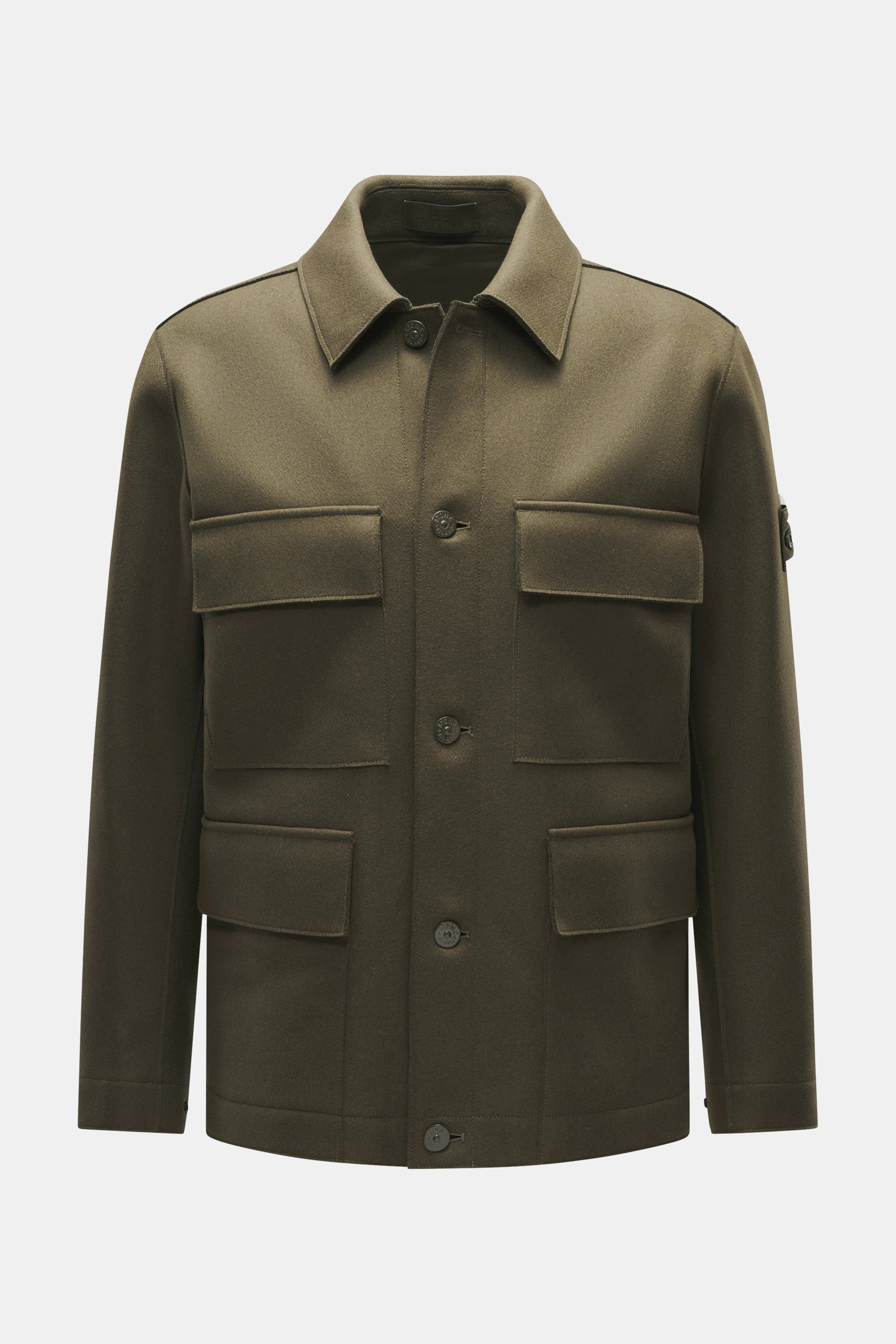 Front view of Stone Island Jacket 'Panno Ghost Piece' olive, slim fit with mix of wool and microfiber, textured feel, five-button placket, patch chest and front flap pockets, turn-down collar, tonal compass badge on sleeve, buttoned cuffs, smooth lining, 