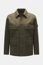Front view of Stone Island Jacket 'Panno Ghost Piece' olive, slim fit with mix of wool and microfiber, textured feel, five-button placket, patch chest and front flap pockets, turn-down collar, tonal compass badge on sleeve, buttoned cuffs, smooth lining, 