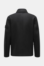 Back view of Stone Island Jacket 'Panno Ghost Piece' black, slim fit with mix of wool and microfiber, textured feel, five-button placket, patch chest and front flap pockets, turn-down collar, tonal compass badge on sleeve, snap button cuffs, smooth lining