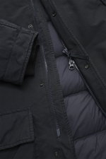 Close-up front view of Stone Island Down Jacket 'Ghost Piece David-TC' navy showing high-quality microfiber fabric, velvety touch, garment dyed surface, warm down filling, regular fit, robust two-way zipper, wind flap with snap buttons, elastic cuffs, qui