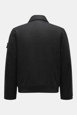 Back view of Stone Island Blouson 'Wool Nylon Flannel Ghost Piece' black, slim fit with turn-down collar, six-button placket, tonal badge, buttoned cuffs, quilted lining, inside pocket, made from a mix of virgin wool and microfiber with a soft feel.