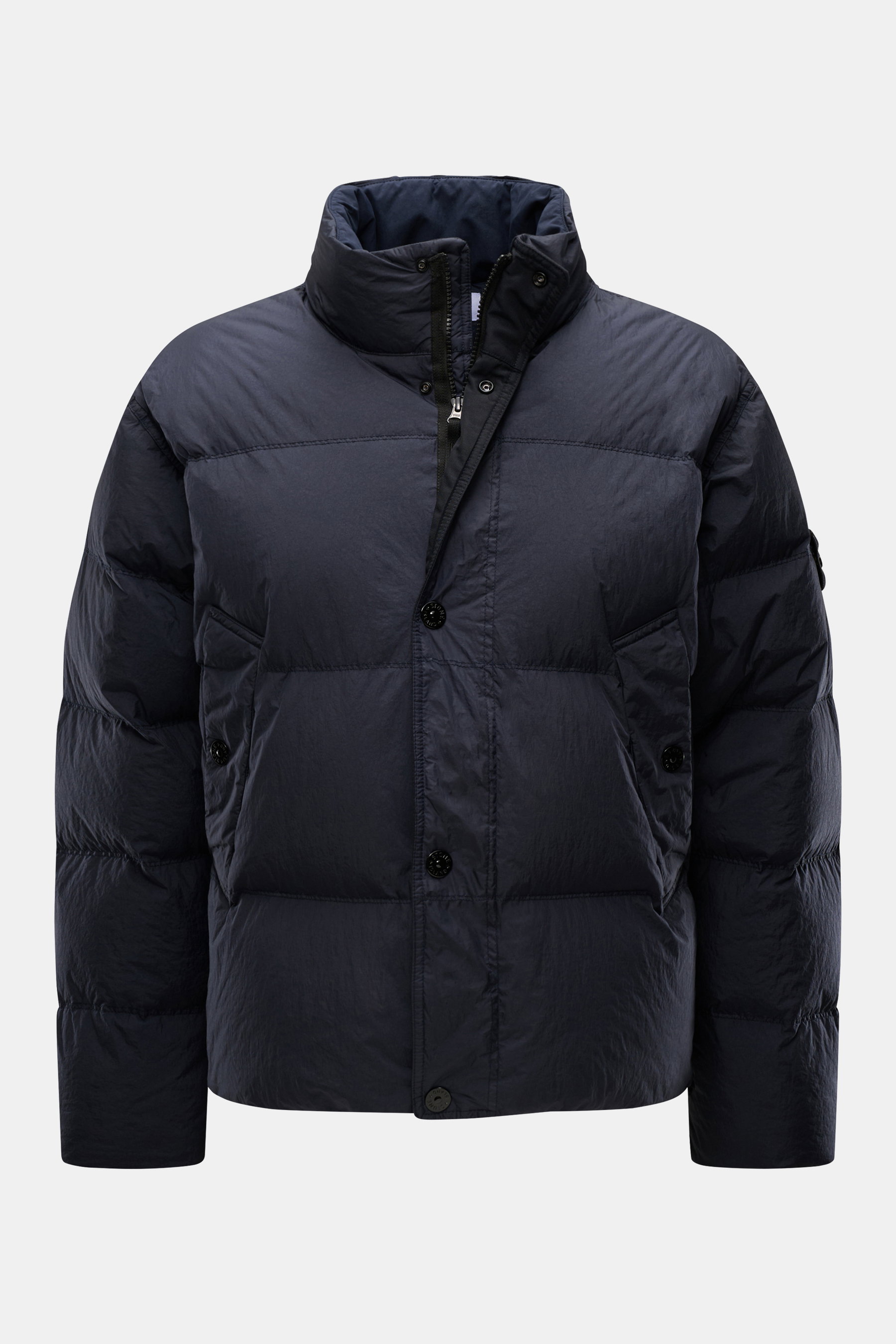 Stone Island Down jacket 'Garment Dyed Crinkle Reps NY' dark navy shown from front, lightweight with windproof, water-repellent fabric, high collar, two-way zip, snap button storm flap, slanted hip pockets, signature compass badge, adjustable hem, warm do