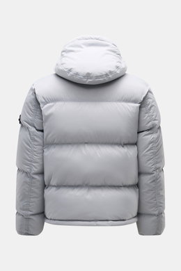 Stone Island Down Jacket 'Matt Ripstop Cordura' Smoky Blue shown from the back, featuring a detachable hood, elastic cuffs, and padded design. Technical performance in urban design: The down jacket 'Matt Ripstop Cordura' from STONE ISLAND impresses with r