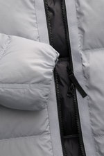 Close-up front view of Stone Island Down Jacket 'Matt Ripstop Cordura' Smoky Blue, showing water-repellent ripstop fabric, two-way zipper, and soft puffy sleeve. 

Description: <p>Technical performance in urban design: The down jacket 'Matt Ripstop Cordur