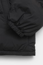 Close-up view of the sleeve and hem of the Canada Goose Down jacket 'Sterling' black, featuring high-quality microfiber, smooth touch, water-repellent fabric, warm down filling, oversized fit, high-closing two-way zipper, wind flap with snap buttons, quil