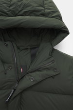 Canada Goose Down jacket 'Sterling' dark green shown from a close-up front angle, featuring high-quality microfiber, smooth touch, water-repellent fabric, warm down filling, oversized fit, high-closing two-way zipper, wind flap with snap buttons, quilted 
