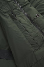 Close-up front view of Canada Goose Down jacket 'Sterling' dark green, showing high-quality microfiber, smooth touch, water-repellent fabric, warm down filling, oversized fit, high-closing two-way zipper, wind flap with snap buttons, quilted hood with dra