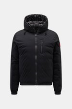 Front view of Canada Goose Down jacket 'Lodge Hoody' black with padded hood, ripstop microfiber fabric, slim fit, two-way zip, breast and side pockets, elastic cuffs, and Canada Goose logo on sleeve. Maximum comfort in a lightweight design with lightweigh