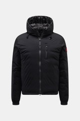 Front view of Canada Goose Down jacket 'Lodge Hoody' black with padded hood, ripstop microfiber fabric, slim fit, two-way zip, breast and side pockets, elastic cuffs, and Canada Goose logo on sleeve. Maximum comfort in a lightweight design with lightweigh