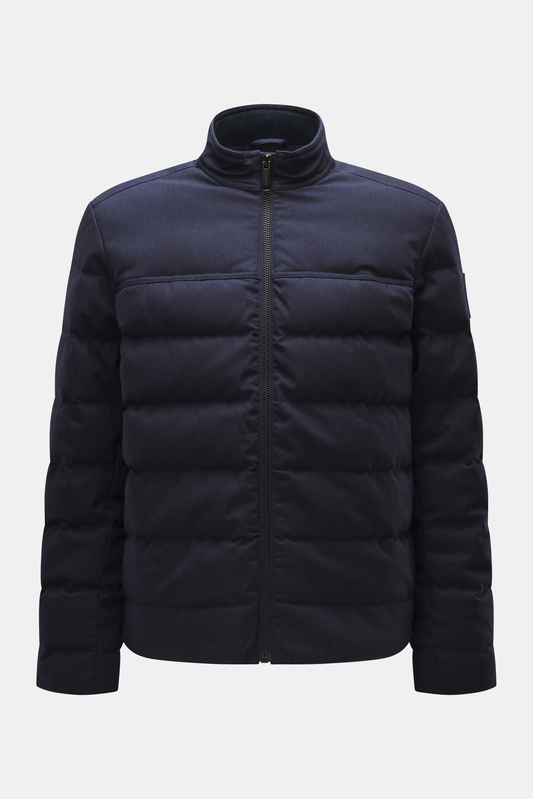 Front view of Canada Goose Down jacket 'Metro' dark blue, slim fit with high-closing zipper, elastic cuffs, warming down filling, soft lining, two inner pockets, zipper side pockets, and CANADA GOOSE label on the upper arm. Maximum comfort in a lightweigh