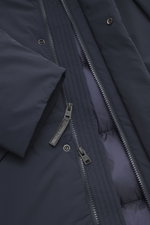 Close-up front view of Woolrich Down jacket 'Matt' navy showing high-quality microfiber fabric, durable two-way zipper, wind flap with snap buttons, and quilted lining fabric.