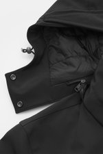 Woolrich Softshell down jacket 'Barrow' black shown from above, highlighting detachable hood with drawstring, softshell elastic microfiber, smooth feel, water-repellent, lightweight duck down and graphene fiber filling, slim fit, two-way zipper, wind flap