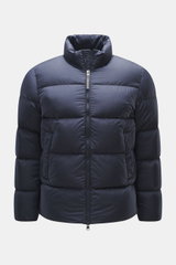 Woolrich Down jacket dark blue shown front view, slim fit with high-quality microfiber, smooth feel, warm down filling, durable two-way zipper, piped front pockets, adjustable hem, quilted lining fabric, and two inner pockets.