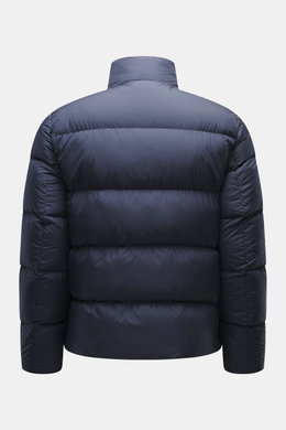 Woolrich Down jacket dark blue shown from the back, made of high-quality microfiber with smooth feel, warm down filling, slim fit, durable two-way zipper, piped front pockets, adjustable hem, quilted lining fabric, and two inner pockets.