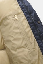 Close-up interior view of Woolrich Down jacket 'Cloud Davis' dark blue, showing high-quality microfiber, smooth touch beige lining, warm down filling, slim fit, robust two-way zipper, welted hand warming pockets, front pockets with flap, practical hood, q