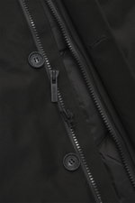 Close-up front view of Woolrich Down jacket 'Heavy GTX' black showing high-quality microfiber fabric, robust two-way zipper, wind flap with buttons; features wind- and water-repellent, warm down filling, slim fit, high-closing collar with hood, side pocke