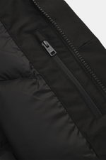 Close-up front view of Woolrich Down jacket 'Heavy GTX' black, showing high-quality microfiber, wind- and water-repellent fabric, warm down filling, slim fit, robust two-way zipper, wind flap with buttons, high-closing collar with hood, side pockets, prac