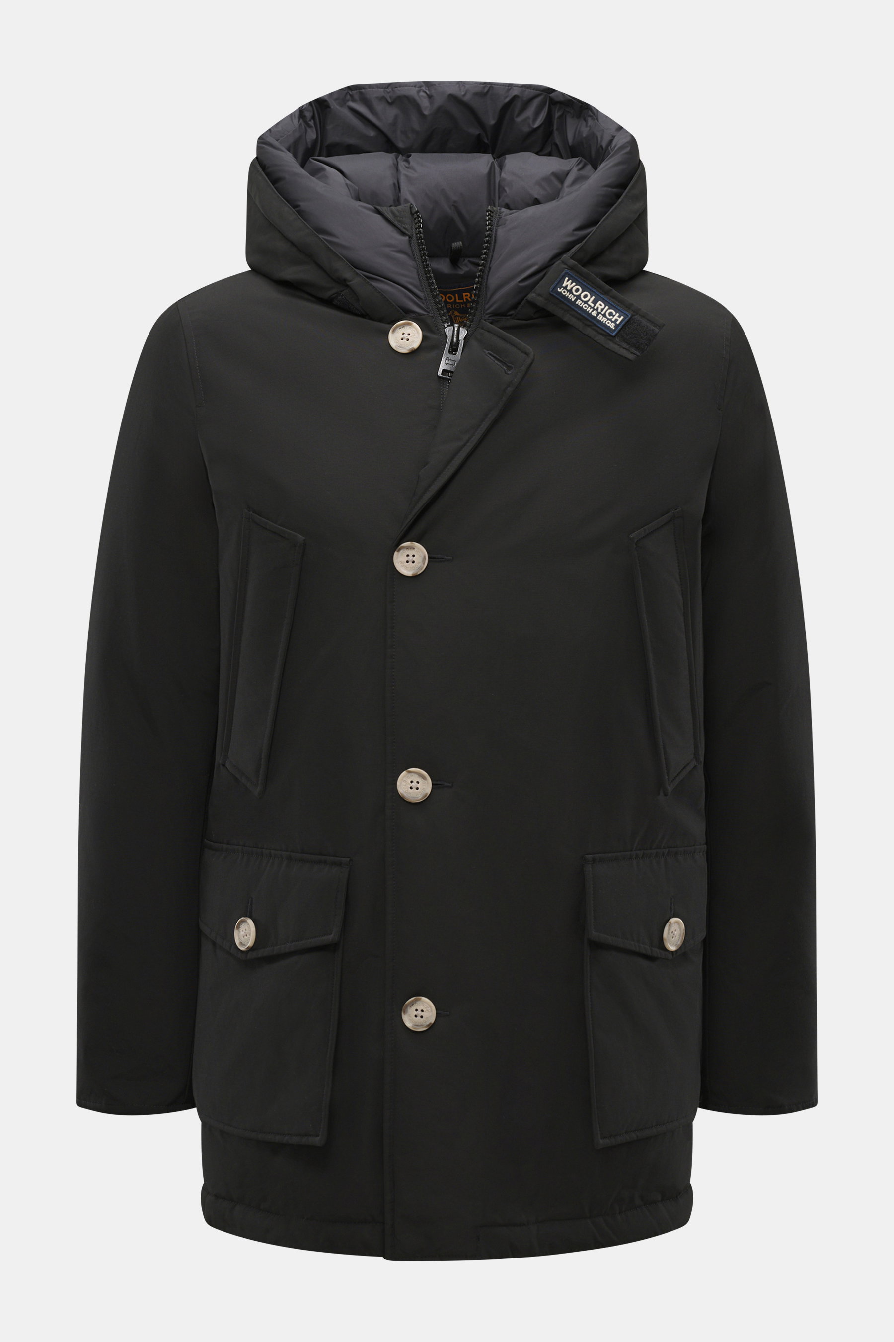 Front view of Woolrich Down parka 'Arctic Parka' black, a slim-fit cold-weather jacket with cotton-microfibre blend, warm down lining, wind- and water-repellent, two-way zip, storm flap with buttons, flexible down-lined hood, collar tab, fleece-lined fron