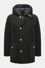 Front view of Woolrich Down parka 'Arctic Parka' black, a slim-fit cold-weather jacket with cotton-microfibre blend, warm down lining, wind- and water-repellent, two-way zip, storm flap with buttons, flexible down-lined hood, collar tab, fleece-lined fron