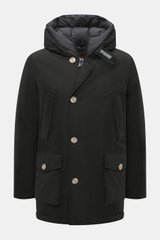 Front view of Woolrich Down parka 'Arctic Parka' black, a slim-fit cold-weather jacket with cotton-microfibre blend, warm down lining, wind- and water-repellent, two-way zip, storm flap with buttons, flexible down-lined hood, collar tab, fleece-lined fron