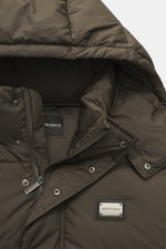 Close-up front view of Emporio Armani Down jacket brown featuring high-quality microfiber, soft touch, warm down filling, slim fit, two-way zipper, wind flap with snap buttons, detachable hood, front pockets with snap button, logo patch made of leather an