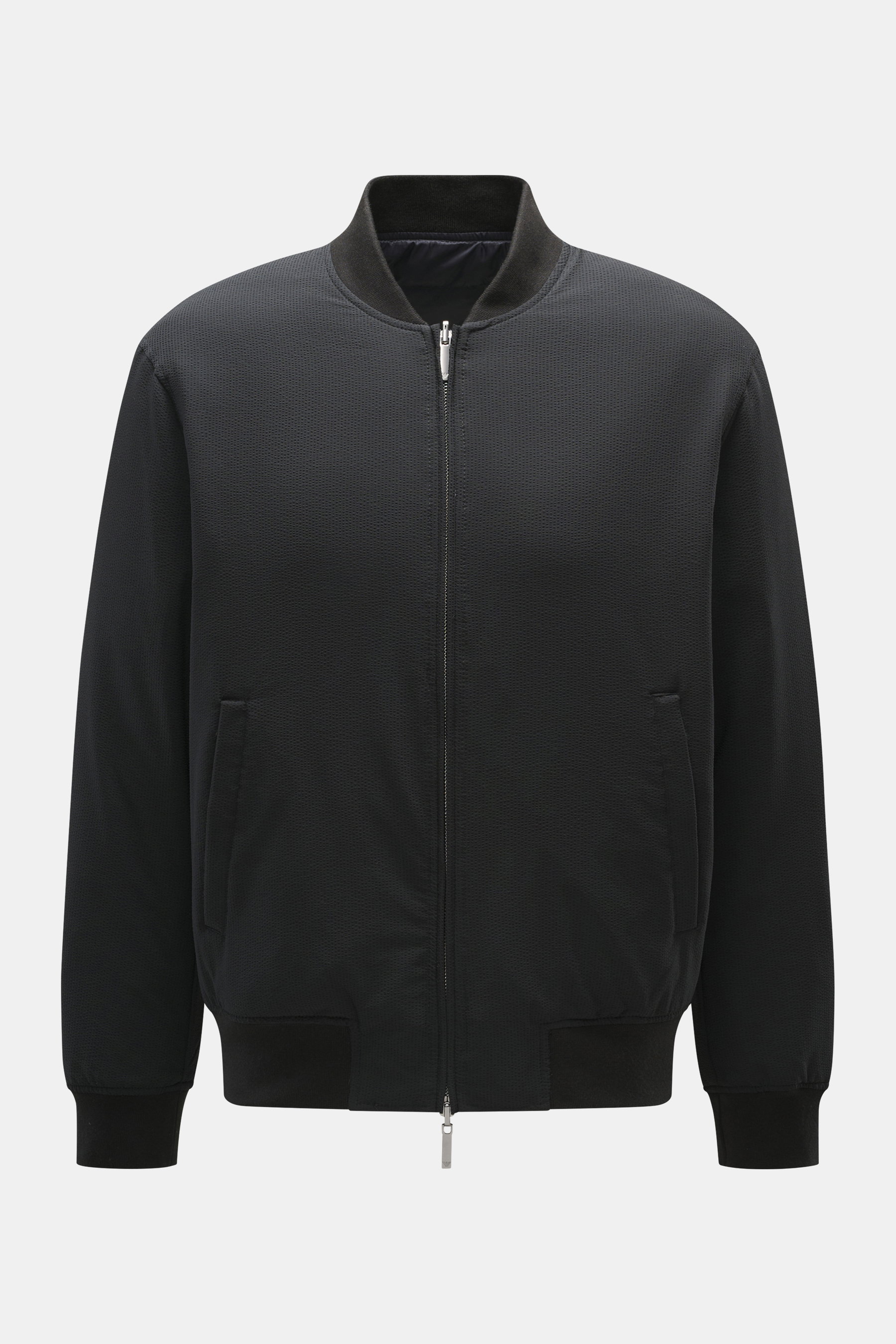 Front view of Emporio Armani Down reversible blouson navy jacket made of high-quality microfiber with soft touch, light down filling, regular fit, durable two-way zipper, classic blouson collar, piped front pockets, elastic hem and sleeve cuffs.