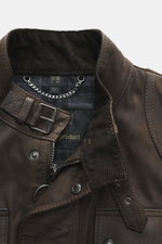 Close-up front view of Belstaff Leather Jacket 'Gangster' Brown showcasing noble nubuck leather, slim fit, robust zipper, wind flap, adjustable buckles, and checkered lining.

Description: <p>For a cool look since 1969: The leather jacket 'Gangster' by th