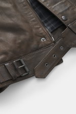 Belstaff Leather Jacket 'Gangster' Brown close-up from above showing noble nubuck leather, robust zipper, press studs, buckle belt, and checkered lining fabric. For a cool look since 1969: The leather jacket 'Gangster' by the biker label BELSTAFF is an ic