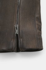 Belstaff Leather Jacket 'Gangster' Brown close-up from front showing noble nubuck leather, robust zipper, ribbed detailing, and stitching for a slim fit. For a cool look since 1969: The leather jacket "Gangster" by the biker label BELSTAFF is an icon that
