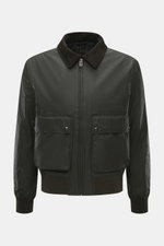 Front view of the Belstaff Wax blouson 'Mount Jacket' dark olive in waxed cotton with corduroy collar, patch pockets, ribbed cuffs, and metal zipper, featuring checked cotton lining and a slim fit, combining military aesthetics with British motorcycle tra