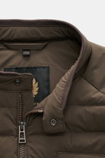 Close-up view from above of the collar and zipper area of the Belstaff Down jacket 'Chassis' dark brown, showing high-quality microfiber with elastic, smooth touch fabric, light down filling, water-repellent surface, slim fit design, durable zipper, and s