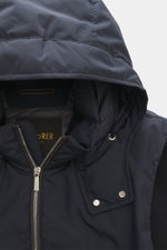 Close-up front view of the Moorer Down Jacket 'Evan' navy showing the detachable hood, two-way zipper, and rib-knit collar, knit from elastic cotton with fine knit pattern, high-quality microfiber body, smooth touch, light down filling, slim fit, detachab