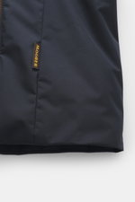 Close-up view of the navy Moorer Down Jacket 'Evan' showing the discreet MOORER woven label on elastic cotton knit fabric with fine knit pattern.