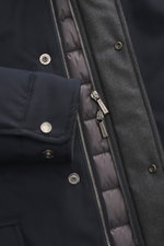 Close-up front view of Moorer Down Jacket 'Pagni' navy showing high-quality microfiber fabric, silver zippers, snap buttons, and padded down filling.

Description: The down jacket 'Pagni' by MOORER perfectly combines functionality and timeless style. Made