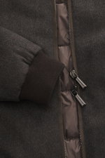 Close-up front view of Moorer Down blouson 'Donizetti' grey melange showing knit virgin wool-cashmere fabric, ribbed cuff, two-way zipper, and quilted lining. High performance at temperatures from above freezing to below zero: The knitted down blouson 'Do