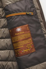 Close-up interior view of the Moorer Down Blouson 'Billati' dark brown, showing high-quality microfiber lining, ripstop fabric, inner zippered pocket with orange zipper, and Finest Down label. Functional outerwear with timeless elegance from MOORER: Ready