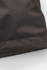 Close-up image from a front angle of Moorer Down jacket 'Albini' anthracite showcasing its high-quality microfiber, soft touch, and water-repellent fabric with stitching detail.