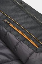 Close-up front interior view of Moorer Down jacket 'Mougi' anthracite showing zippered pocket with orange trim and quilted lining.

Description: <p>Functional outerwear with timeless elegance from MOORER: Ready for autumn with the down jacket 'Mougi' made