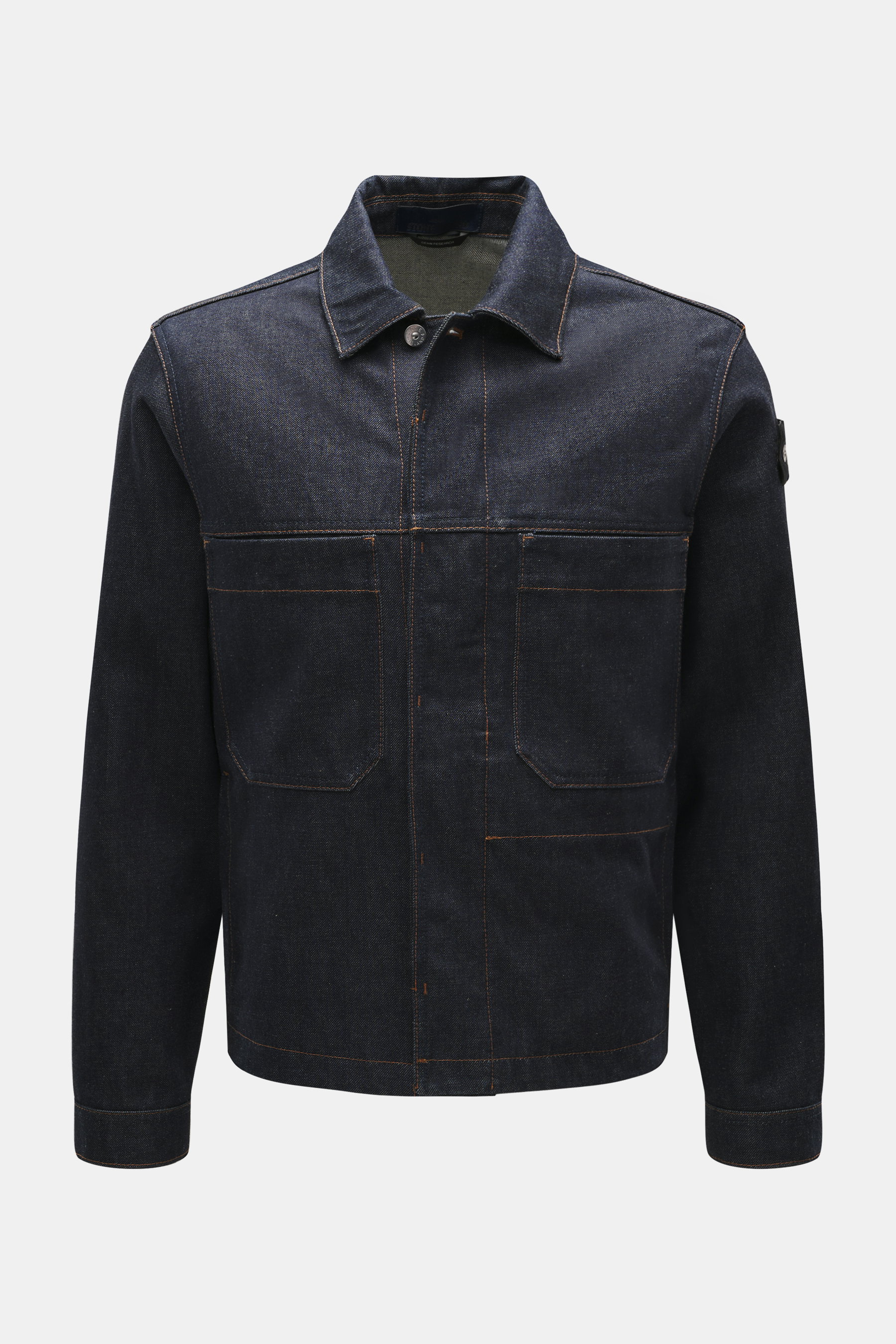 Stone Island Denim jacket 'Indigo Denim-Raw' navy front view, slim fit raw denim cotton jacket with concealed button placket, turn-down collar, patch front pockets, compass badge on upper sleeve, and cuffs with button.