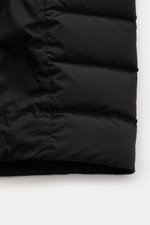 Close-up view of black Stone Island Down Jacket 'Seamless Tunnel Nylon Down-TC' showing quilted microfiber fabric and stitching details.

<p>The STONE ISLAND 'Seamless Tunnel Nylon Down-TC' jacket impresses with innovative manufacturing, lightweight down 