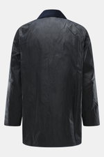 Back view of Barbour Wax jacket 'Beaufort' dark navy, long-cut waxed cotton with corduroy collar, showing smooth, water-repellent texture.

Description: True classic from BARBOUR: The long-cut wax jacket 'Beaufort' made of water-repellent, waxed cotton wi