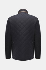 Barbour Quilted jacket 'Powell Quilt' navy shown from the back with diamond quilting, stand-up collar with corduroy trim, faux leather cuffs, and adjustable waist tabs, featuring light padding and fleece lining for cold weather.