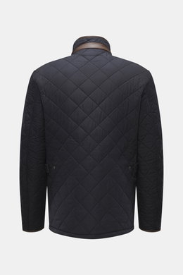 Barbour Quilted jacket 'Powell Quilt' navy shown from the back with diamond quilting, stand-up collar with corduroy trim, faux leather cuffs, and adjustable waist tabs, featuring light padding and fleece lining for cold weather.