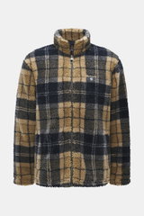 Front view of Barbour Fleece jacket 'Tartan Sherpa' beige/navy checked with thick microfiber sherpa fleece, classic check pattern, stand-up collar, high zipper, and Barbour chest stitching.